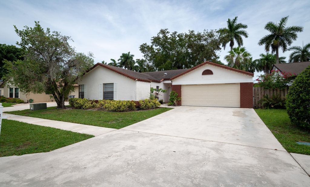 Photo of 11690 Timberwood Road, Boca Raton, FL 33428 (MLS # B26042657)