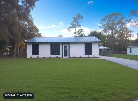 Photo of 8001 Hibiscus Road, Fort Pierce, FL 34951 (MLS # B26064043)