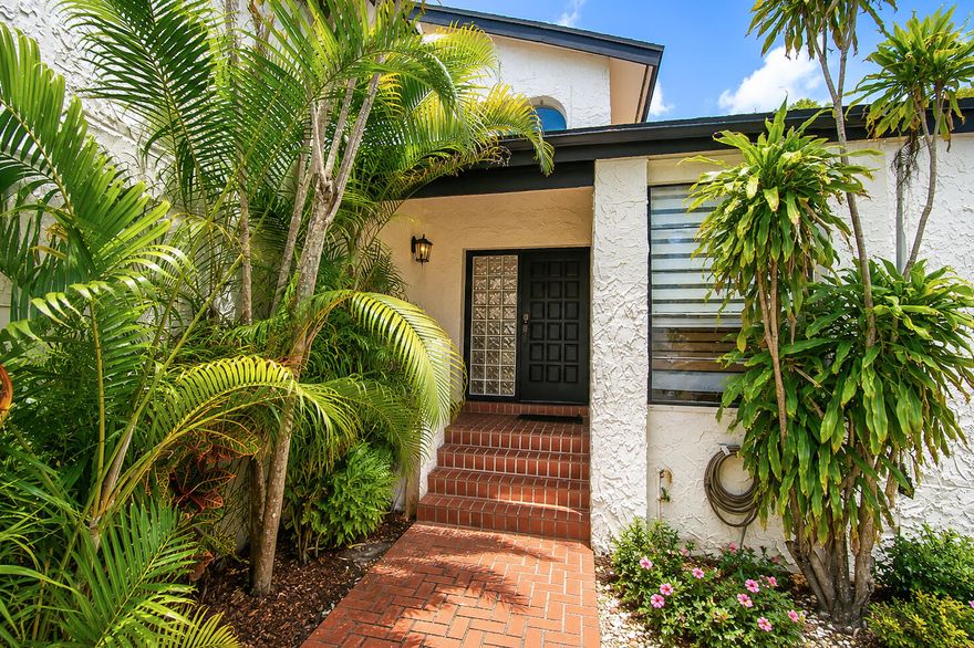 This lovely three bedroom, two and a half bath, two story home in Vista Verde is a MUST SEE!  Experience culinary excellence in the stunning, professionally designed kosher kitchen. This chef's delight features specialized dual zones, double sinks and two dishwashers for ultimate convenience. Enjoy superior cooking performance with top of the line Samsung stainless steel appliances, anchored by sleek, fast heating induction cooktop.    The upper level is anchored by a massive private owner's suite- a true second-floor sanctuary designed for relaxation, complete with ample room for a seating area and over-sized walk-in closet.   The roof was installed in 2017. There are two AC units, one was installed in 2021 and the other in 2024.   This stunning Boca Raton lakefront home features a spacious covered patio designed for ultimate relaxation and entertainment, offering panoramic, serene views of one of the area's most beautiful lakes. Located in a sought-after neighborhood, this residence boasts seamless indoor-outdoor living, perfect for enjoying South Florida's sunshine in the shade.  This home could be your own private oasis with a large pool and privacy hedges.   Vista Verde has a great tot lot for young children and is pet friendly. This home is close to great shopping, restaurants and Houses of Worship.