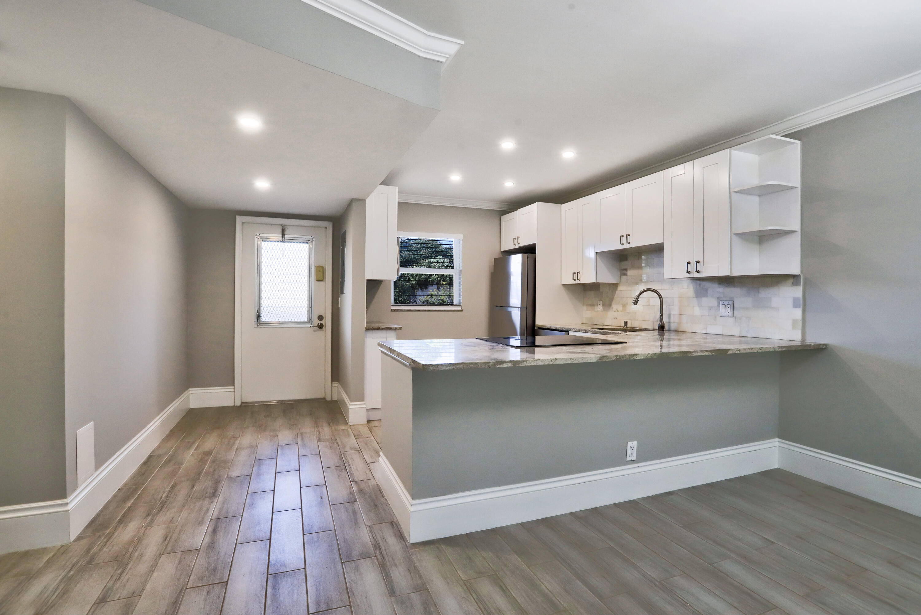 LOCATION! LOCATION! LOCATION!This sophisticated, upgraded 2/2 condo in the heart of vibrant Delray Beach is available for rent!Come enjoy this secluded area in Delray just minutes from the beach, restaurants and shops!Upscale features include Hurricane Impact Windows to invite lots of sunlight security and quietness. Luxury flooring throughout unit, with granite, stainless steel appliances and soft close cabinetry in the kitchen. Spacious bedrooms with lots of closet space. Separate laundry room with full size wash and dryer. All LED lighting with remote fans in all bedrooms and living-room. Basic Cable & water Included!Come see for yourself!NON SMOKERS ONLY.