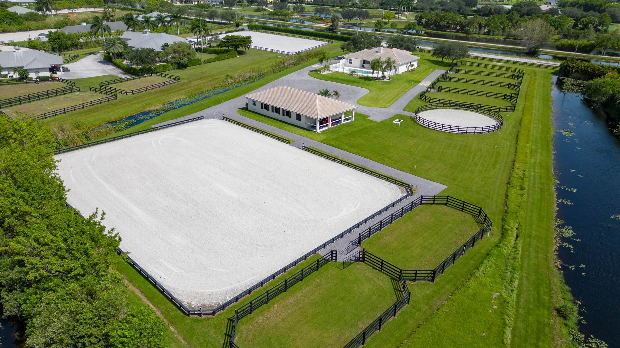 Charming 8-Stall Barn for Lease - Ready for the 2025/26 Season!This beautifully updated barn is move-in ready and perfectly equipped for the upcoming season. Featuring newer stall fronts and rubber brick flooring throughout the aisle the center aisle barn.The property boasts a 125' x 175' ESI riding arena with premium all-weather footing, six lush paddocks with high fencing, and a 60' round pen, also with top-grade footing.A newer irrigation system services the arena, paddocks, and round pen, and a new washer/dryer. There's ample trailer parking and turn-around space.Tucked away on a tranquil street yet just a short golf cart ride to the showgrounds, this location offers the perfect blend of privacy and proximity.Pricing is for whole barn (all 8 stalls) for a 4 months.