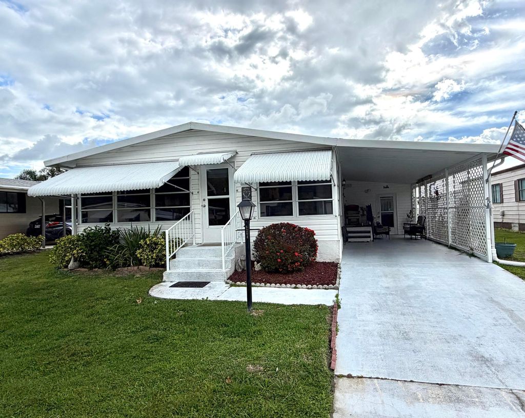 Photo of 8204 W Bitterbush Lane, Port Saint Lucie, FL 34952 (MLS # B26017106)