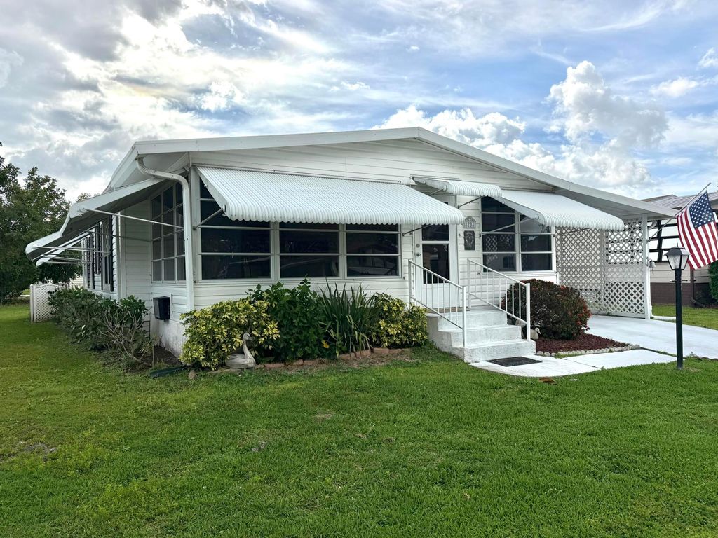 Photo of 8204 W Bitterbush Lane, Port Saint Lucie, FL 34952 (MLS # B26017106)