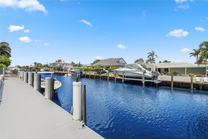 Experience the pinnacle of South Florida waterfront living in this fully renovated masterpiece. Every inch of this residence has been thoughtfully reimagined, blending modern sophistication with upscale coastal living. Soaring ceilings, oversized tile flooring, and expansive windows fill the home with natural light. The open living area flows seamlessly outdoors, and the chef’s kitchen, overlooking the Intracoastal, features Bosch appliances and a 48” built-in JennAir fridge. Outside, enjoy a sleek modern pool and 85 ft of deepwater frontage with a private dock and direct ocean access. With smart home technology, a full-house gas generator, impact windows, and brand-new systems throughout, every detail has been thoughtfully curated for comfort, convenience, and elevated living.