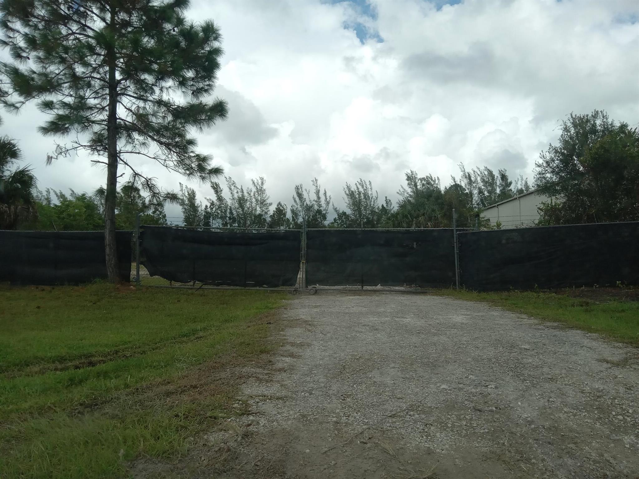 : Vacant Industrial lot in Palm Beach Commerce Park. 1 acre fully fenced, cleared, and ready for rental. This would be great for a private warehouse, storage, business, etc. Zoning is PIPD, which allows light industrial. There are several established businesses in the park now. Including Walgreens Distribution Center, Verizon, Moving & Storage, Marine/Boat Building, FPL, Distributions, etc. Commerce Park is located off of Pratt Whitney Rd between Indiantown Rd. and Beeline Highway. Turn on to Corporate Rd N from Pratt Whitney Rd then turn left on Assembly Loop.