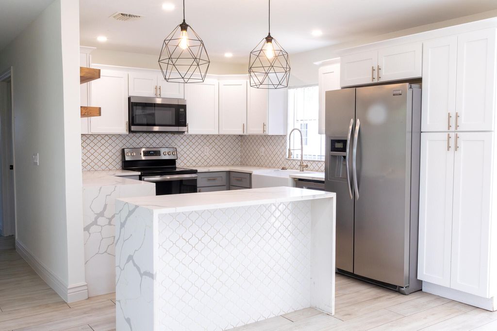 Photo of 3360 Sapphire Road, Lake Worth, FL 33462 (MLS # B26013049)