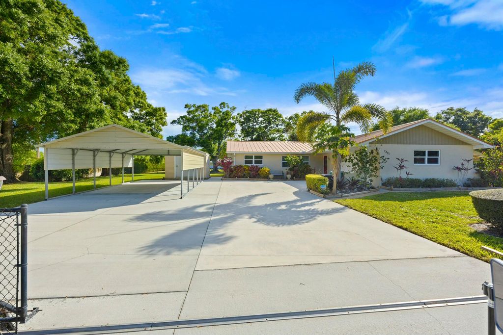 Photo of 7301 Santa Barbara Drive, Fort Pierce, FL 34951 (MLS # R11066528)