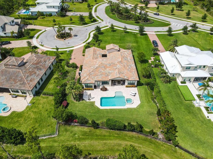 Exquisite 4 bedroom, 5 full bath, 1 half bath, plus club room and 3 car garage with peaceful preserve views in the highly desired gated community of Prado. This extended Yorkshire model is situated on a 3/4 acre premium lot on a cul-de-sac and boasts many upgrades. This home provides all the essentials of South Florida living with solid CBS construction, impact glass, spray foam insulation, a whole house generator, a 500 gallon in-ground propane tank, an Aquasoft water purification system, and reverse osmosis in the kitchen. Luxury Living with low HOA fees.