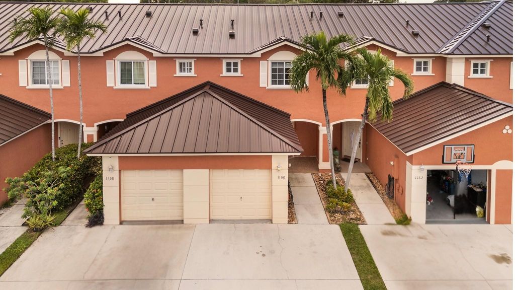 Photo of 1160 NW 100th Ave #1160, Pembroke Pines, FL 33024 (MLS # F10532827)
