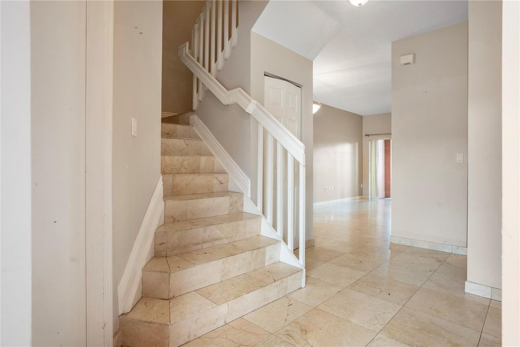 Photo of 1160 NW 100th Ave #1160, Pembroke Pines, FL 33024 (MLS # F10532827)