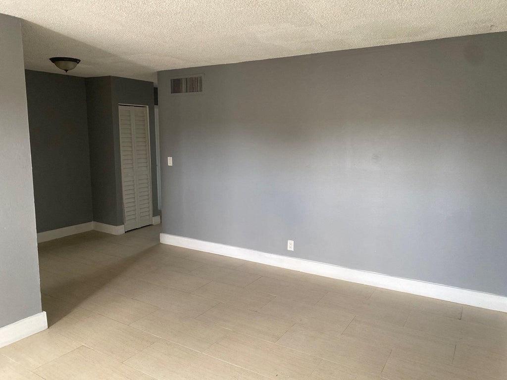 Photo of 4800 NW 24th Court #D117, Lauderdale Lakes, FL 33313 (MLS # B26041918)