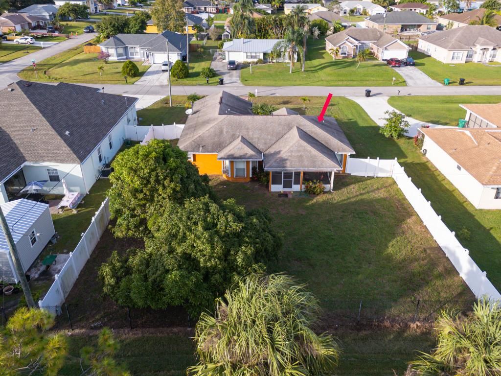 Photo of 594 SW Grove Avenue, Port Saint Lucie, FL 34983 (MLS # R11140864)