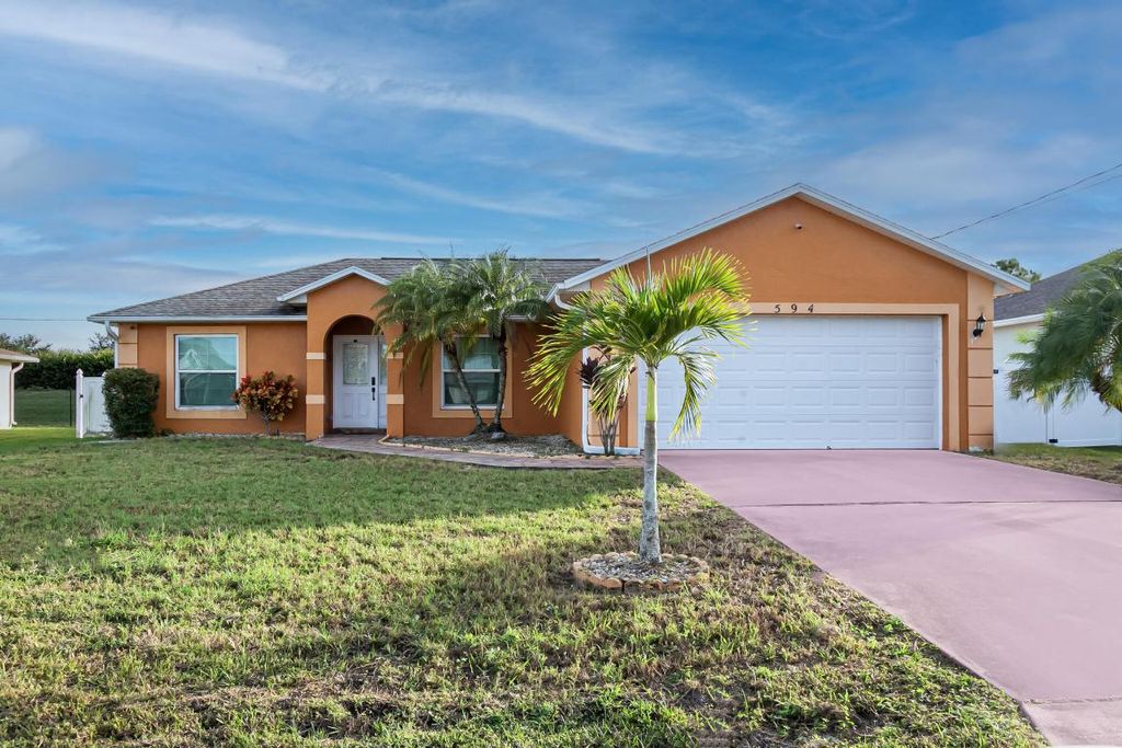 Photo of 594 SW Grove Avenue, Port Saint Lucie, FL 34983 (MLS # R11140864)