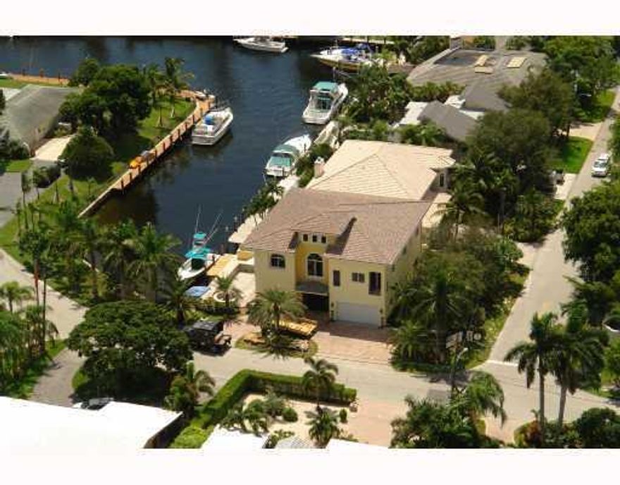 Not a Short Sale! East of US1 and just minutes from the Atlantic Ocean with no fixed bridges.  This beautiful 6 bedroom 4 bath home should be yours and comes with a fully assumable (to ANY buyer) 750K assumable mortgage.The Hillsboro inlet is less than 20  minutes away.  This custom home has an 1150 sq ft master suite on its own level; huge closets modern bath and a sitting room.  Downstairs are two bedrooms and full bath.  Upstairs are three bedrooms and up to the master suite. Owner says SELL!