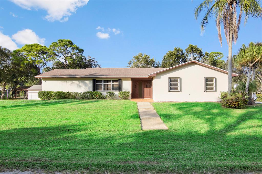 3 Bed/2 Bath home with a 2-car Garage in Jupiter, Florida (Limestone Creek Community). This home sits on .92 acres and is conveniently located near Jupiter Community Park and Limestone Creek Nature Preserve, I-95, Florida Turnpike, and Southwest Fork Loxahatchee River. Located in unincorporated Palm Beach, no HOA, entire parcel is beautifully landscaped with mature mango trees, two water-well pumps with sprinkler system, city water and sewer. Tenant to pay electricity, water, sewer, internet, $38/adult background check fee, $150 cleaning fee, 1st, last, security (3x rent).
