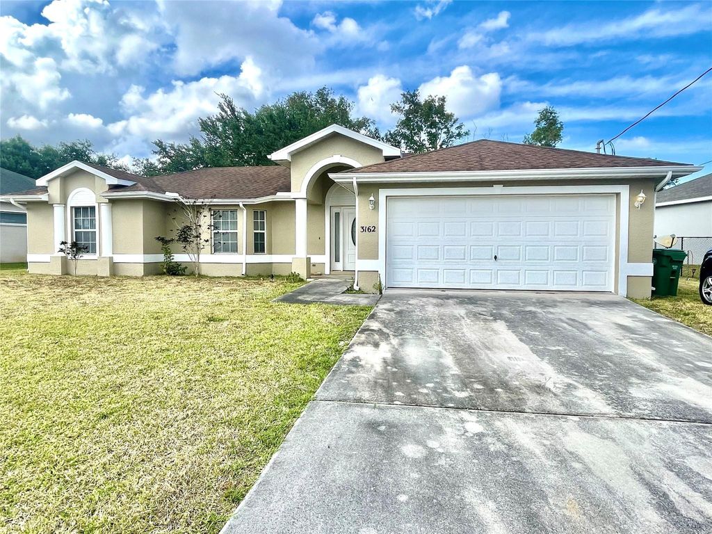 Photo of 3162 SW Ann Arbor Road, Port Saint Lucie, FL 34953 (MLS # F10435651)
