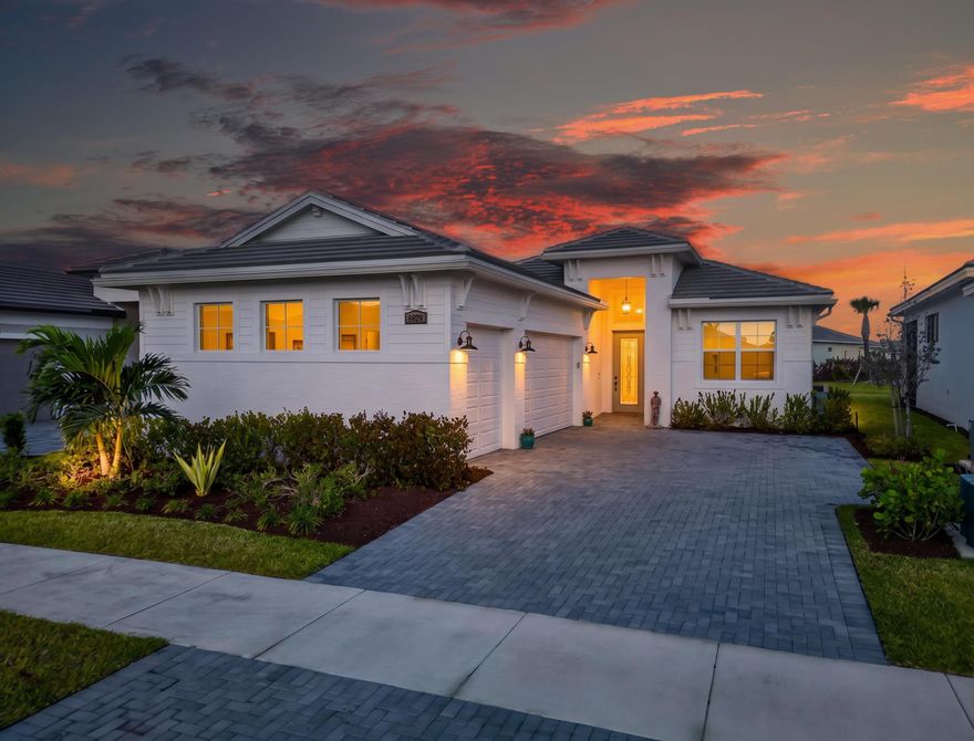 Upgraded & move-in ready LIla on a homesite with partial water views in PGA Verano. Home features 3 beds + den, 3 baths, 3 car garage, 16' x 10' sliding glass door to an extended lanai, creating seamless indoor-outdoor living. Kitchen incl upgraded cabinetry, premium appliances, single-bowl undermount stainless sink, upgraded Moen faucet, pendant lighting, & custom pull-out shelving. Custom built-ins incl pantry, primary closet, & laundry with sink. Laminate flooring throughout (tile in baths, carpet in guest), upgraded hardware, & frameless glass shower in the primary suite. Guest bath converted to a walk-in shower. Upgrades include Hunter Douglas remote shades, whole house water system with reverse osmosis, upgraded washer and dryer, ceiling fans throughout. Pool pics are proposed. _____________  8629 SW Cantante Way | PGA Verano | Port St. Lucie, FL  This is the one buyers wait for—Lila Floorplan loaded with high-end upgrades, move-in ready, and located on a premium homesite with a partial water view inside PGA Verano.  From the moment you walk in, the difference is obvious. A glass front entry door sets the tone, leading into a bright, open floor plan anchored by a 16' wide x 10' tall four-track sliding glass door that fully opens to the extended lanai—bringing indoor and outdoor living together seamlessly.  The kitchen is dialed in with upgraded cabinetry, premium appliance package, single-bowl undermount stainless sink, upgraded Moen faucet, pendant lighting, and custom pull-out shelving. No wasted space, no builder-grade shortcuts.  Storage and organization are next level:  Custom pantry built-ins Custom master closet system Laundry room with built-in shelving and sink  The home features laminate flooring throughout (tile in baths, carpet in guest), upgraded hardware, and a frameless glass shower enclosure in the primary suite. The guest bath has been upgraded from tub to a walk-in shower—what buyers actually want.  Step outside to a 4' extended lanai and primary suite extension, perfect for relaxing or entertaining while enjoying the water view.  Major functional upgrades include:  Hunter Douglas remote-controlled shades ($9K+) Whole house water system + reverse osmosis Upgraded washer & dryer Ceiling fans throughout (including garage) Mini-split A/C in the 3-car garage  The exterior has also been elevated with a custom upgrade package, giving this home stronger curb appeal than standard builds.  Bottom line: this isn't a base model with a few upgrades—this is a fully thought-out, upgraded home and you can move in right away.  Located in PGA Verano, residents enjoy resort-style living with world-class amenities, pickleball, tennis, fitness, and a vibrant social scene—all just minutes from the 54 hole PGA Golf Club. Community amenities include golf course access-54 hole PGA Golf (memberships avail, not req'd), 27 pickleball courts, 2 fitness centers, 3 pools, 5 HarTru Tennis Courts & Clubhouse.