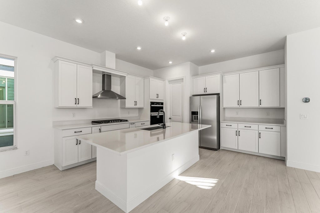 Photo of 10630 SW Pioneer Parkway, Palm City, FL 34990 (MLS # B26082455)