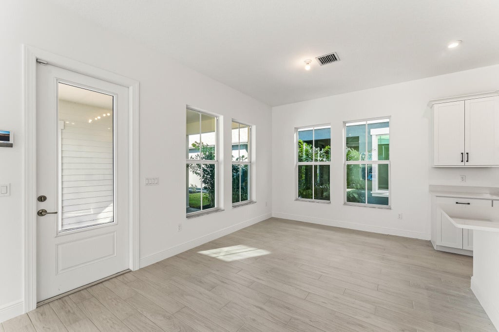 Photo of 10630 SW Pioneer Parkway, Palm City, FL 34990 (MLS # B26082455)