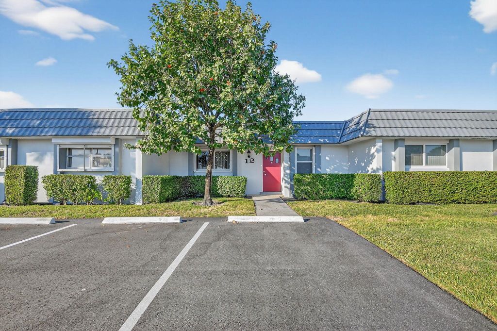 Photo of 2886 Fernley Drive E #12, West Palm Beach, FL 33415 (MLS # R11139137)