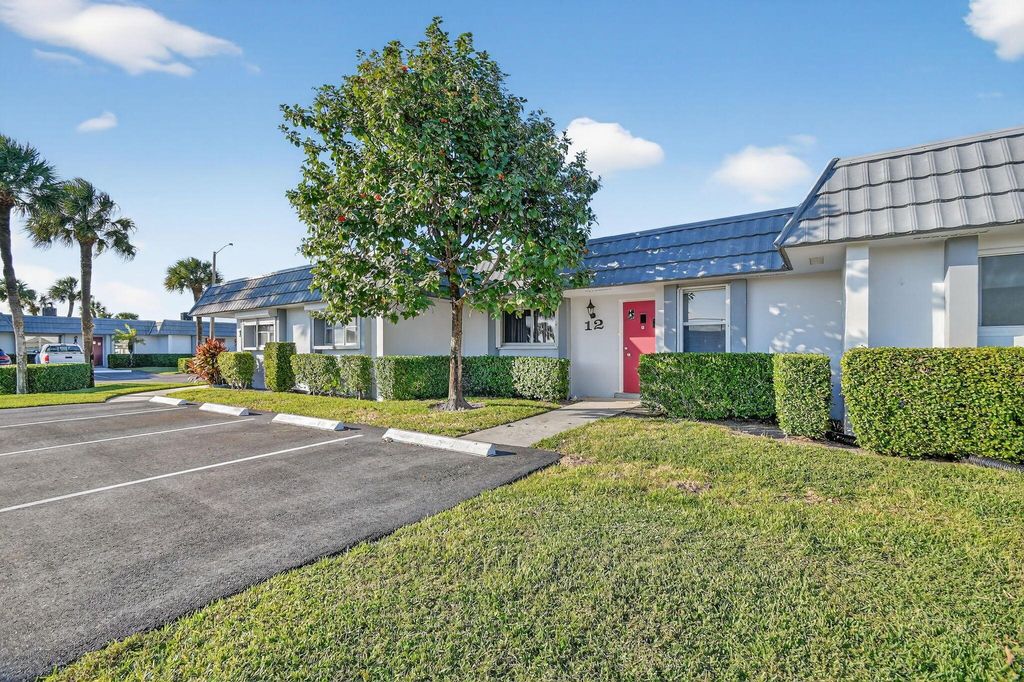 Photo of 2886 Fernley Drive E #12, West Palm Beach, FL 33415 (MLS # R11139137)