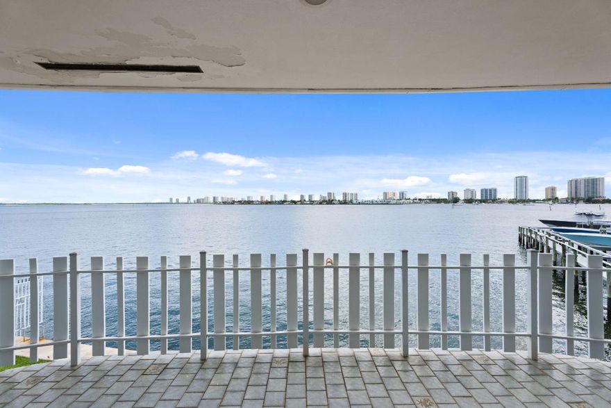 This stunning 2BR/2BA 2nd story condo offers breathtaking Intracoastal views. This unit boasts a stunning balcony overlooking 3+ miles of unobstructed water views. Special features include a large exterior storage unit and covered parking right at your door. Brand new impact glass windows and doors throughout. Nestled in a quiet, gated six-unit community with the lowest HOA and no special assessments. Just a 7-minute walk to Publix. RARE GEM!

This building is exempt from Florida's new condo reserve laws, as it is only two stories with just six units. Furniture may or may not be included in purchase.