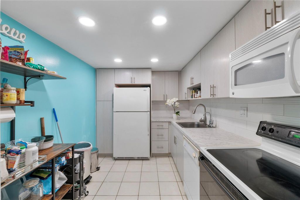 Photo of 7750 W Mcnab Road #203, Tamarac, FL 33321 (MLS # F10511542)