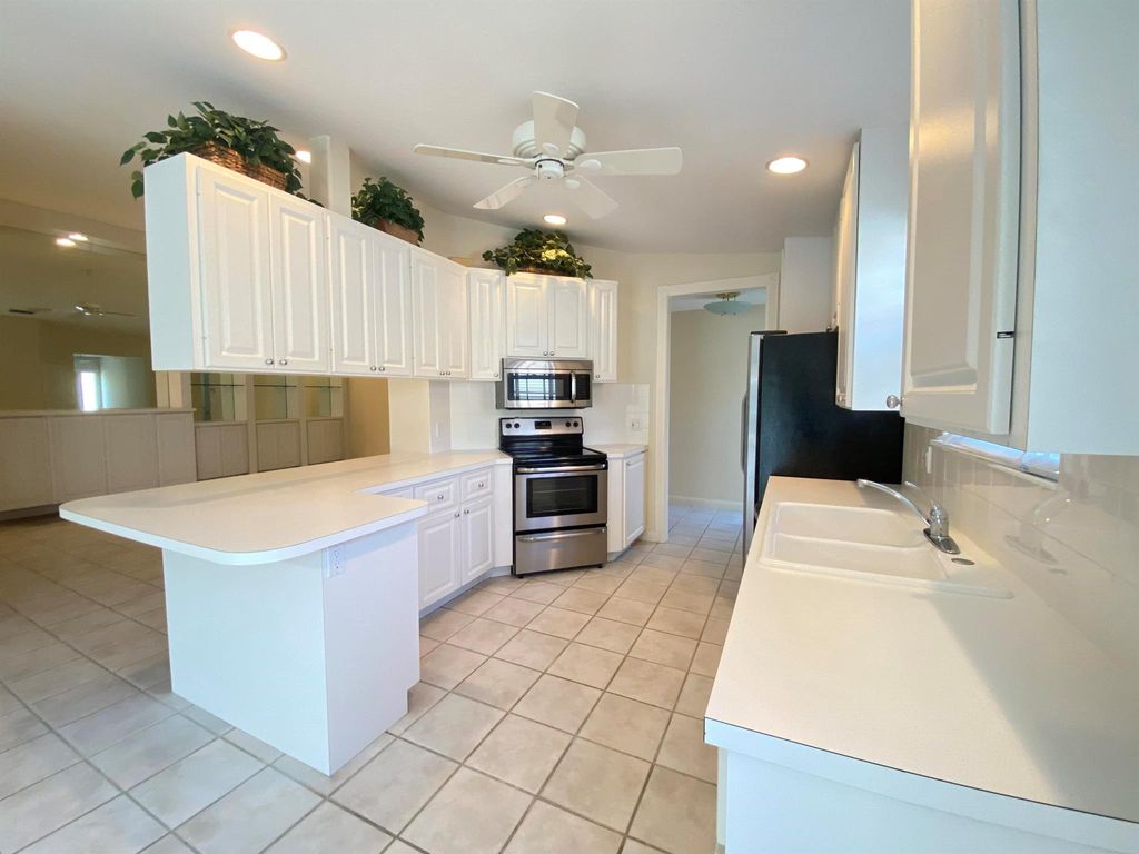 Photo of 2616 Livingston Lane, West Palm Beach, FL 33411 (MLS # R11062874)