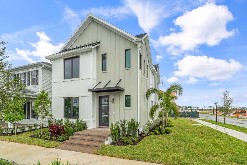 Photo of 911 SW Newfield Avenue, Palm City, FL 34990 (MLS # B26023730)