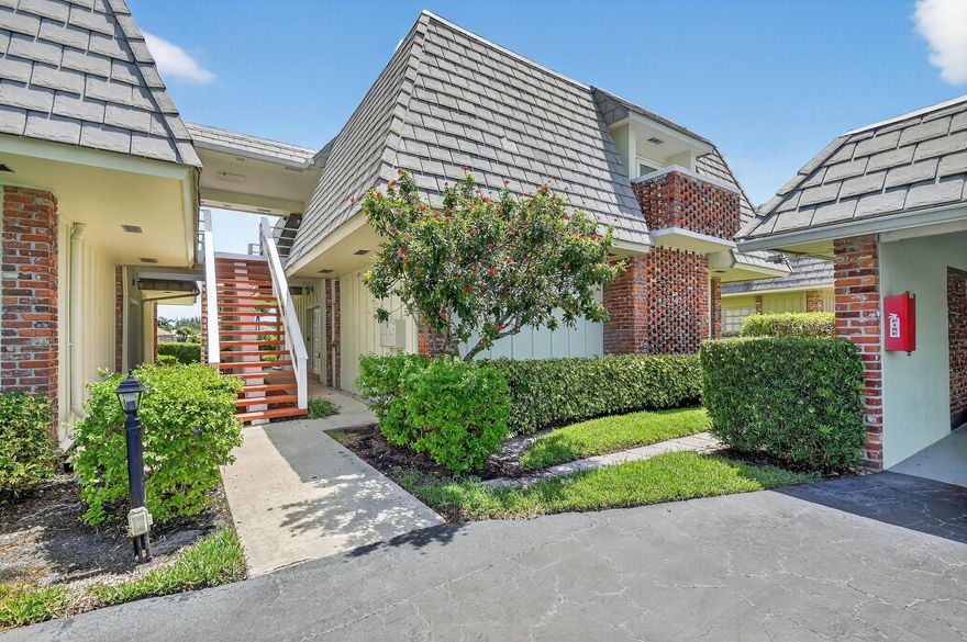 This updated first-floor condo combines comfort, security, and smart design. Featuring newer Washer/Dryer, HVAC, a fully upgraded kitchen, smart home features, and a well-laid-out split floor plan, the space offers seamless indoor-outdoor living with serene golf course views. Enjoy partial hurricane protection, higher elevation, and private parking plus ample guest spots. Northern exposure brings energy efficiency and soft light year-round. HOA includes roof, building insurance, and well-kept common areas, offering excellent value. With ground-level access, modern systems, and a peaceful setting, this home blends lifestyle and practicality in one of Palm Beach County's most desirable communities. Here's your chance to embrace the relaxed, upscale lifestyle that Atlantis offers