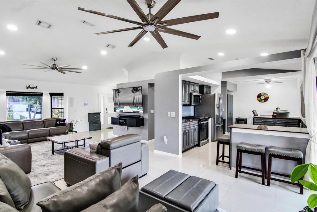 Photo of 1685 SW Schleicher Lane, Port Saint Lucie, FL 34983 (MLS # R11088047)