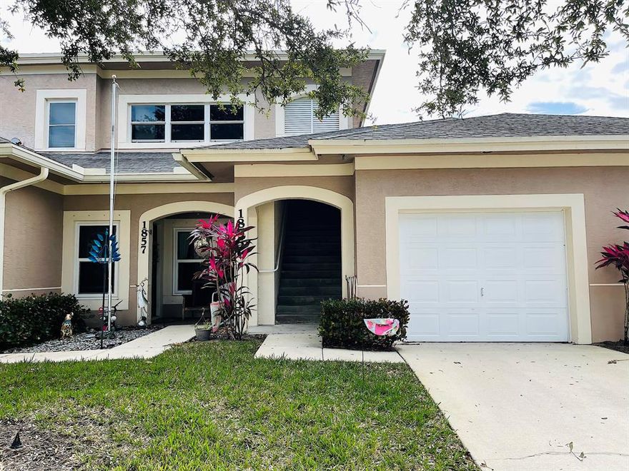 Largest floor-plan in the neighborhood with a private view from your screened-in patio, this 2bed/2bath with a den and garage in ready for you to turn into your own.  High ceilings all around, extra storage room, and hurricane impact glass compliment this condo located next to the clubhouse/heated pool.