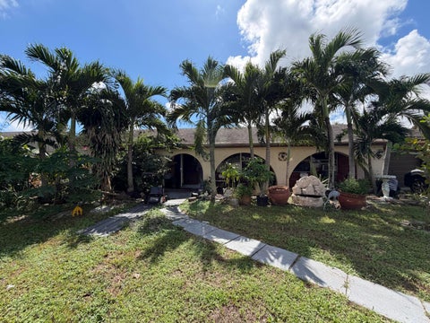 Photo of 3464 ARTESIAN Drive, Lake Worth, FL 33462 (MLS # B26086737)