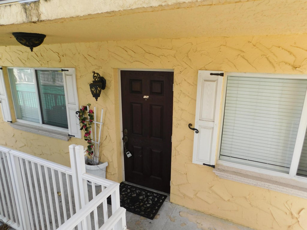 Photo of 735 Hummingbird Way #104, North Palm Beach, FL 33408 (MLS # B26085519)