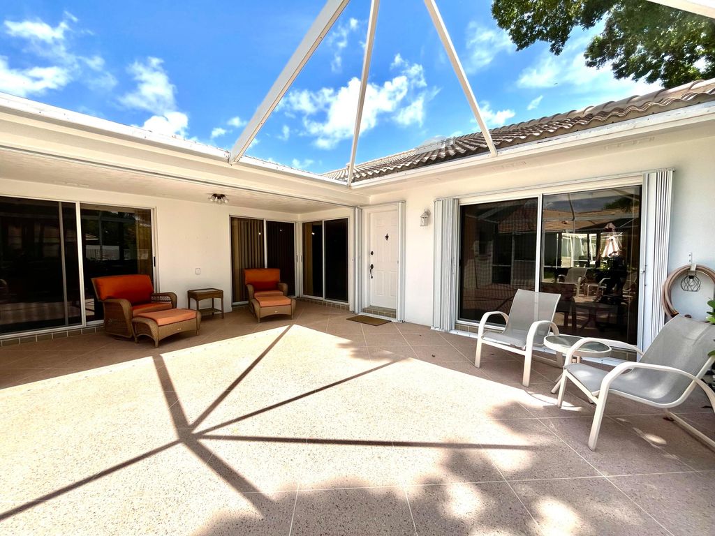 Photo of 604 Silverleaf Oak Court, Palm Beach Gardens, FL 33410 (MLS # B26009499)