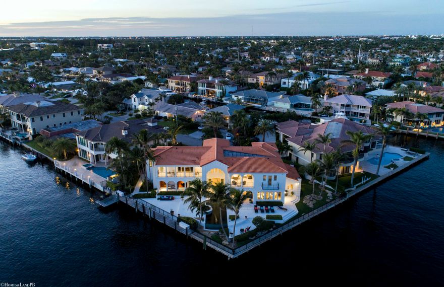Spectacular South East Intracoastal Point Lot Mansion. Tuscan inspired point lot Mega Mansion! 227 seawall, 122 side canal dockage. Infinity pool & spa, fireplace, gourmet kitchen, library, elevator and loft area, 4-car garage, Smart House! Upgrades to property as per the owner: 

5 newer a/c units 
interior repainted in 2015 
exterior repainted in 2016 
new pool heater 
dock electric upgraded for 90 ft lot 
new jet ski lift 
natural gas line run to front of house 
all stone floors and shower refinished in 2015