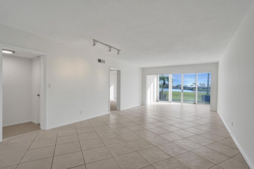 Photo of 169 Atlantis Boulevard #103, Atlantis, FL 33462 (MLS # R11083927)