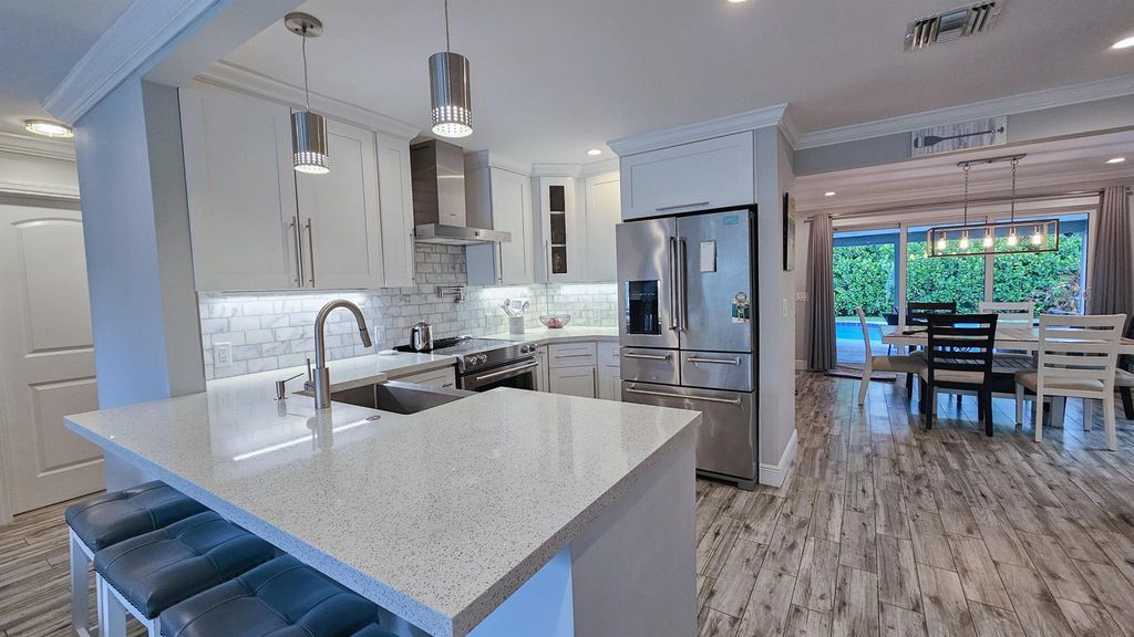 Photo of 124 SW 11th Avenue, Boynton Beach, FL 33435 (MLS # R11010948)