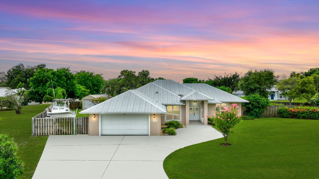 Photo of 2193 SE Dolphin Road, Port Saint Lucie, FL 34952 (MLS # R11003948)