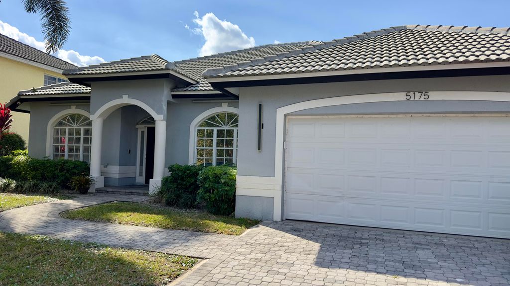 Photo of 5175 NW 50th Terrace, Coconut Creek, FL 33073 (MLS # R11163586)