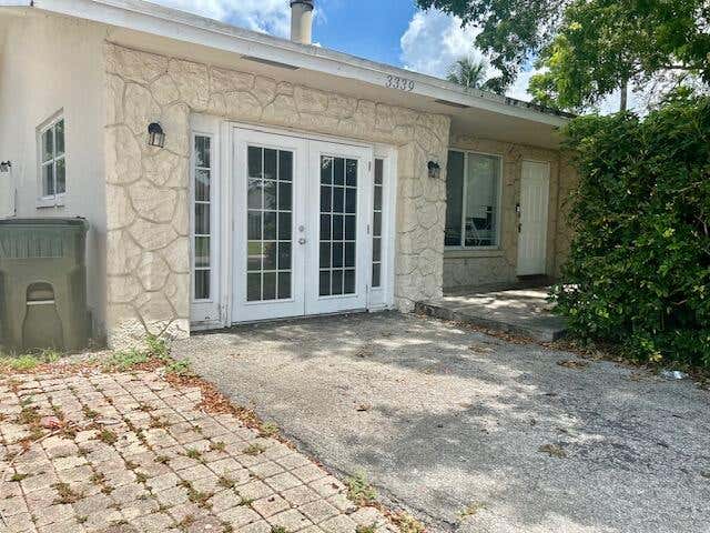 Photo of 3339 NW 69TH Court, Fort Lauderdale, FL 33309 (MLS # B26068419)