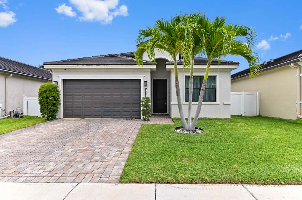 Photo of 7461 Moonrise Drive, Lake Worth, FL 33467 (MLS # B26054517)