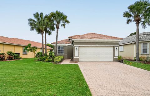Photo of 671 NW Stanford Lane, Port Saint Lucie, FL 34983 (MLS # B26038608)