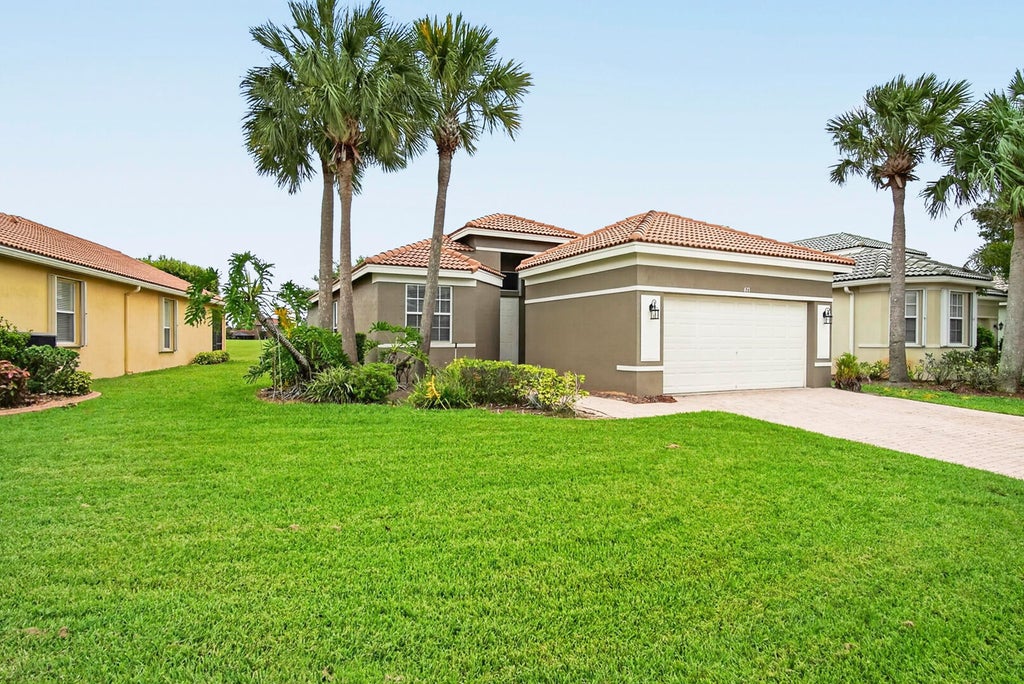Photo of 671 NW Stanford Lane, Port Saint Lucie, FL 34983 (MLS # B26038608)