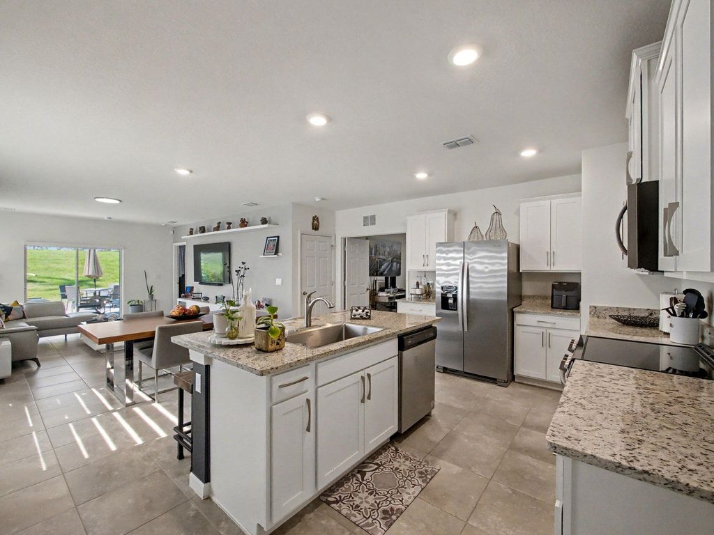 Photo of 11014 SW Vasari Way, Port Saint Lucie, FL 34987 (MLS # B26009091)