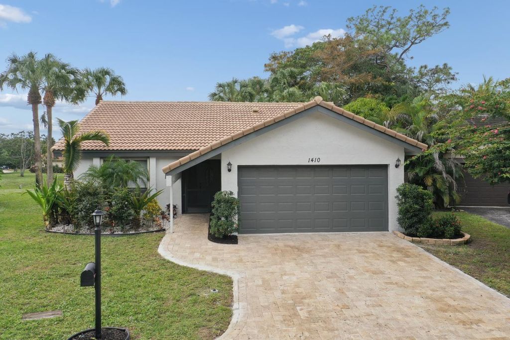 Photo of 1410 Riverwood Lane, Coral Springs, FL 33071 (MLS # F10541923)