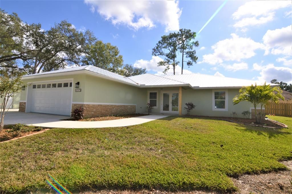 Photo of 2107 SW Madruga Street, Port Saint Lucie, FL 34953 (MLS # R10676494)