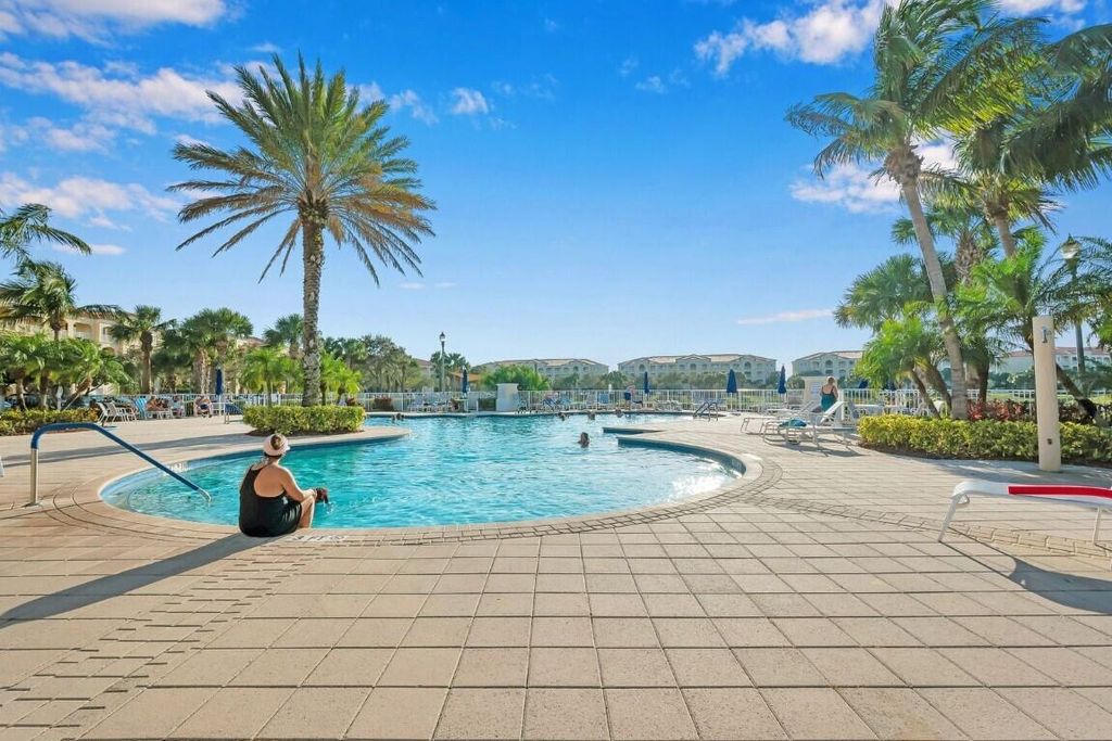 Photo of 32 W Harbour Isle Dr Drive W #203, Fort Pierce, FL 34949 (MLS # B26040677)