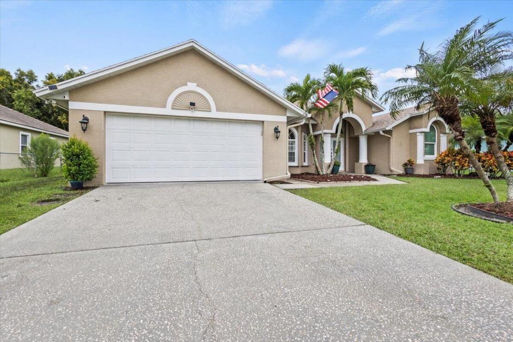 Photo of 6482 NW Regal Circle, Port Saint Lucie, FL 34983 (MLS # R11131706)