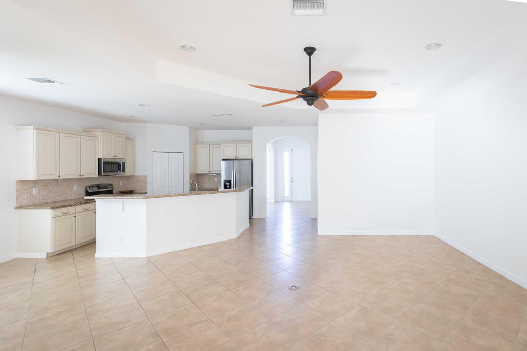 Photo of 4376 NW Oakbrook Circle, Jensen Beach, FL 34957 (MLS # B26034822)